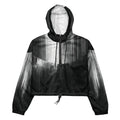 HER Cropped Dither Distortion Windbreaker (No.06) by Form Finding Design, front studio view — cropped hooded jacket with a monochrome graphic distortion print fading from white at the shoulders to dark charcoal at the hem. Features a half‑zip front, black drawstrings, long sleeves and an elasticated hem with a drawcord, displayed on a plain white background