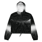 HER Cropped Dither Distortion Windbreaker (No.09) by Form Finding Design, front studio view — cropped hooded jacket with a monochrome graphic distortion print fading from white at the shoulders to dark charcoal at the hem. Features a half‑zip front, black drawstrings, long sleeves and an elasticated hem with a drawcord, displayed on a plain white background