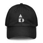 A crisp front view of the black Under Armour x Form Fundamentals Stamp Cap (No.04), showing its six‑panel construction, curved brim and the white geometric Form Fundamentals logo embroidered on the front.