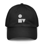 A crisp front view of the black Under Armour x Form Fundamentals Stamp Cap (No.06), showing its six‑panel construction, curved brim and the white geometric Form Fundamentals logo embroidered on the front.