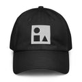A crisp front view of the black Under Armour x Form Fundamentals Stamp Cap (No.14), showing its six‑panel construction, curved brim and the white geometric Form Fundamentals logo embroidered on the front.