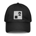 A crisp front view of the black Under Armour x Form Fundamentals Stamp Cap (No.16), showing its six‑panel construction, curved brim and the white geometric Form Fundamentals logo embroidered on the front.