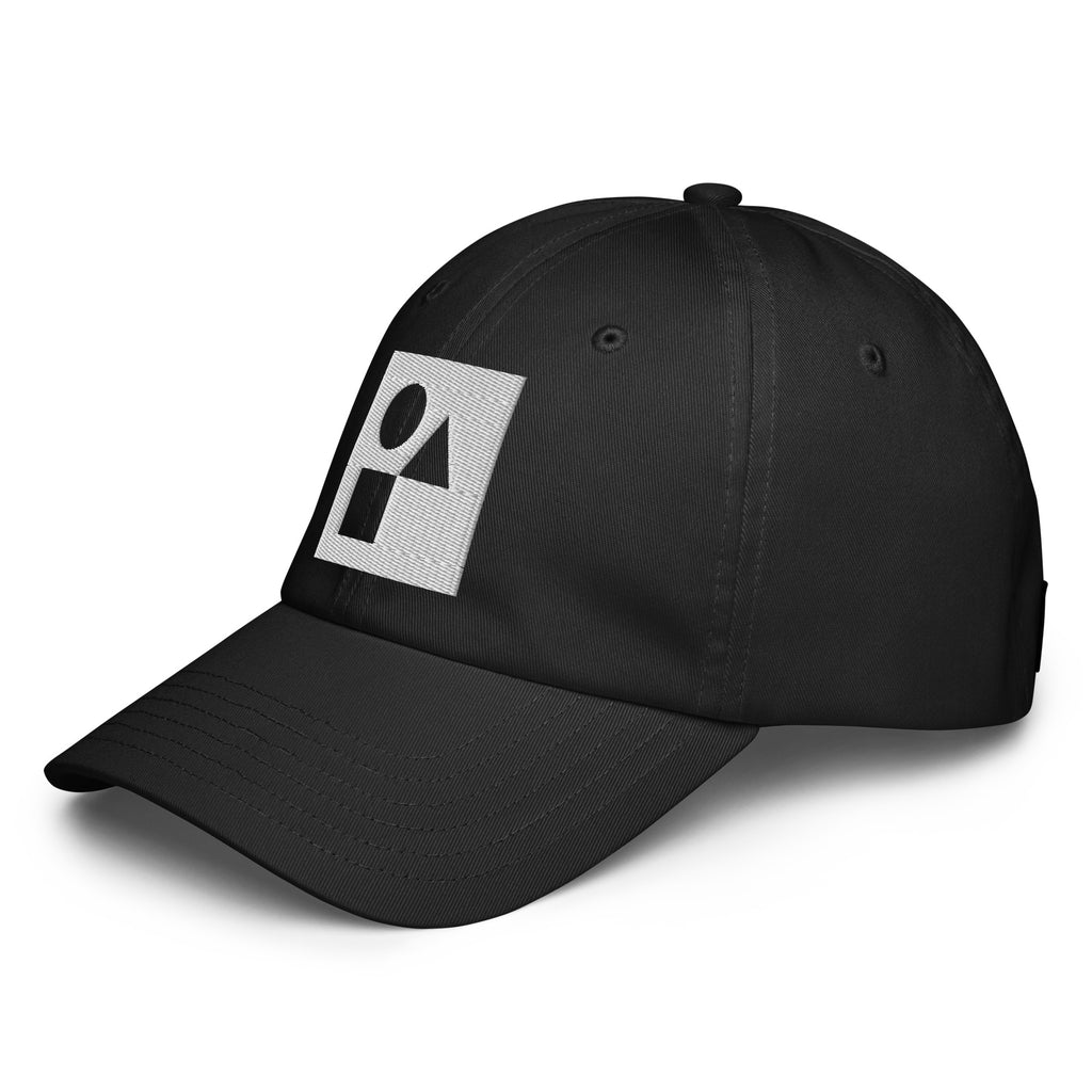 Three‑quarter side view of the black Under Armour x Form Fundamentals Stamp Cap (No.20), highlighting the curved pre‑curved brim, clean six‑panel crown and white geometric Form Fundamentals emblem on the front panel.