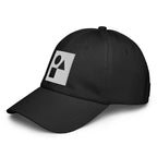 Three‑quarter side view of the black Under Armour x Form Fundamentals Stamp Cap (No.20), highlighting the curved pre‑curved brim, clean six‑panel crown and white geometric Form Fundamentals emblem on the front panel.