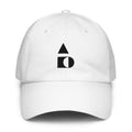 A crisp front view of the white Under Armour x Form Fundamentals Stamp Cap (No.03), showing its six‑panel construction, curved brim and the black geometric Form Fundamentals logo embroidered on the front.