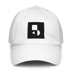 A crisp front view of the white Under Armour x Form Fundamentals Stamp Cap (No.11), showing its six‑panel construction, curved brim and the black geometric Form Fundamentals logo embroidered on the front.