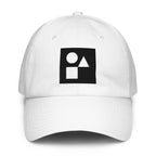 A crisp front view of the white Under Armour x Form Fundamentals Stamp Cap (No.19), showing its six‑panel construction, curved brim and the black geometric Form Fundamentals logo embroidered on the front.