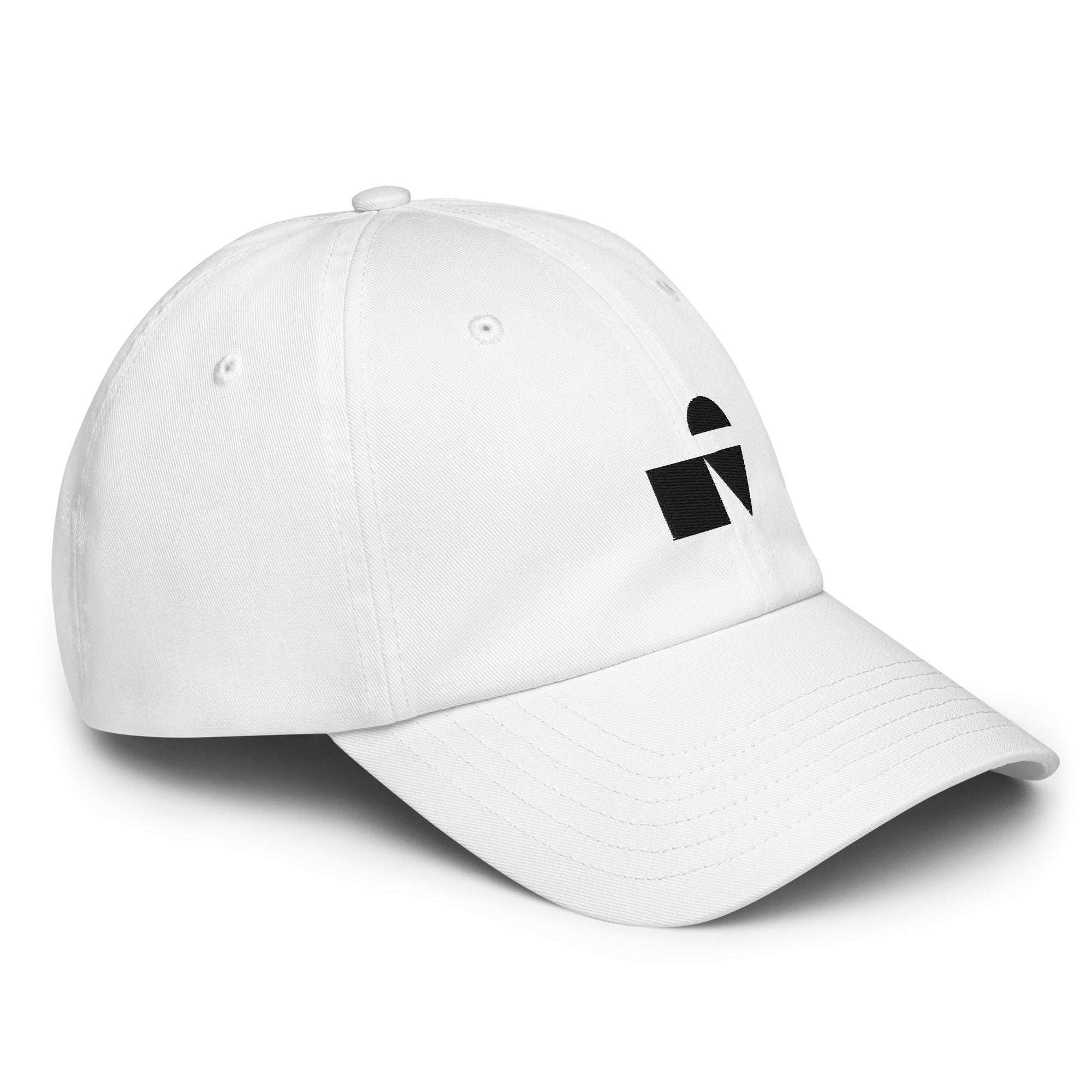 Detailed close‑up of the white Under Armour x Form Fundamentals Stamp Cap (No.09), focusing on the fine fabric texture, stitched seams and partial black Form Fundamentals logo on the side of the structured crown.
